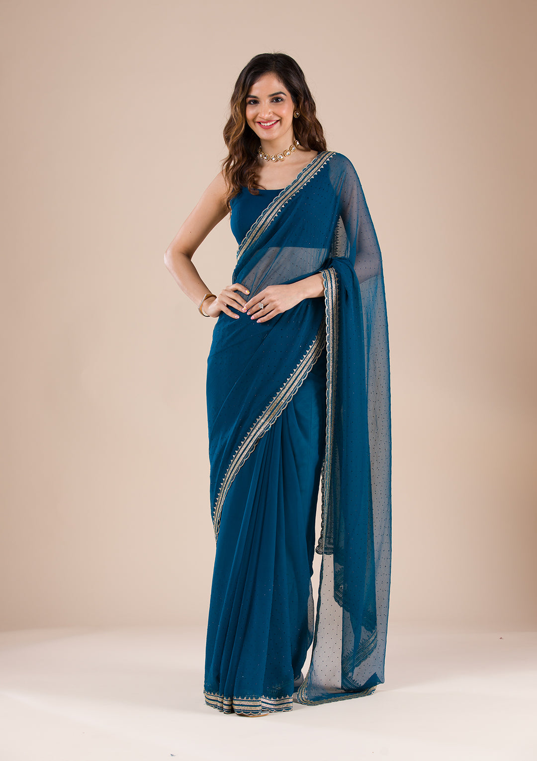 Peacock Blue Chiffon Gold Zariwork Saree With Matching Blouse Piece