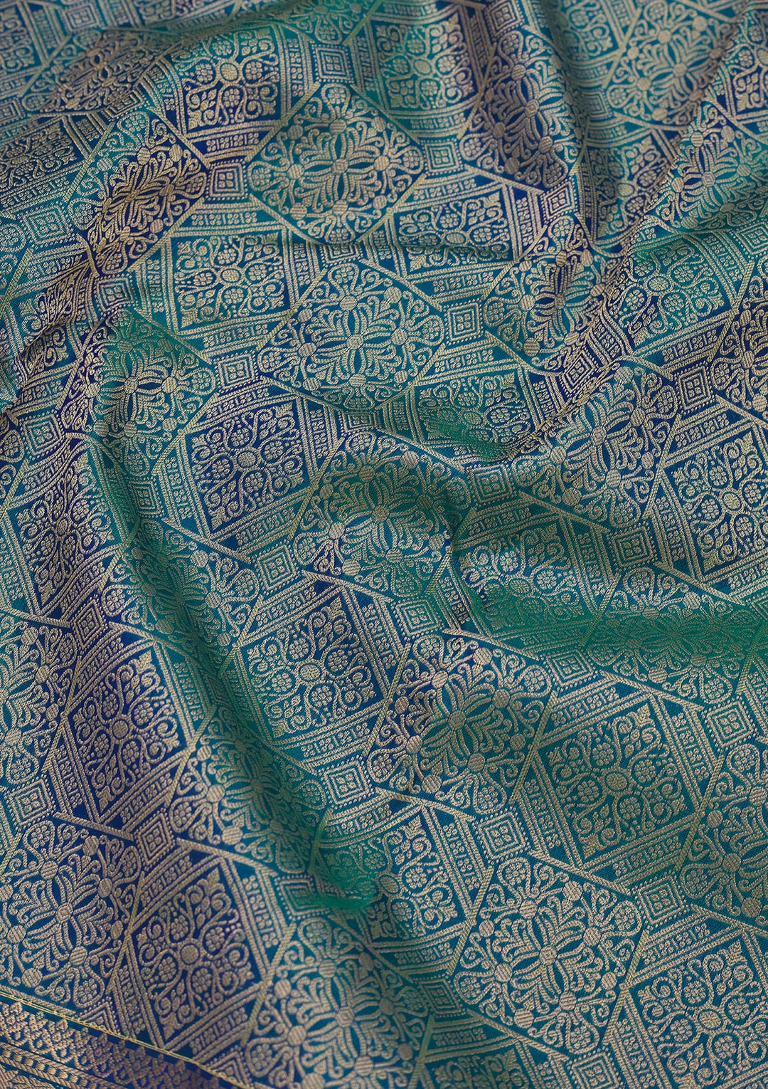 Peacock Blue Silk Jaal Gold Zariwork Saree With Matching Blouse Piece