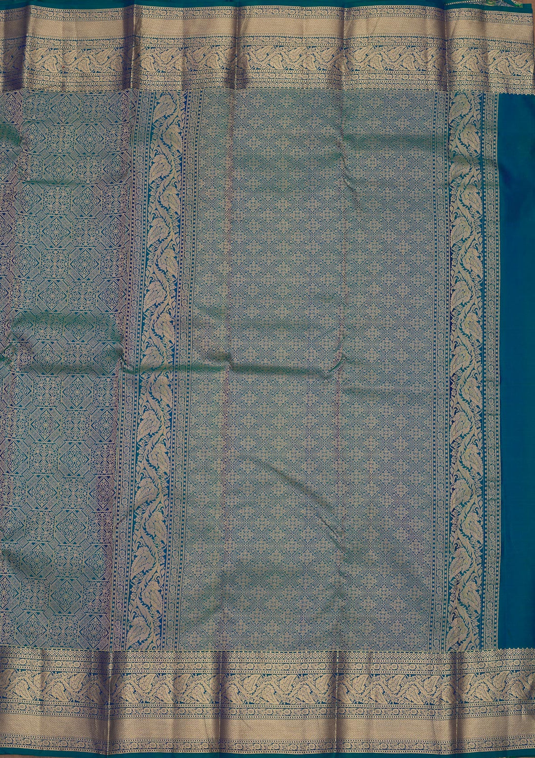Peacock Blue Silk Jaal Gold Zariwork Saree With Matching Blouse Piece