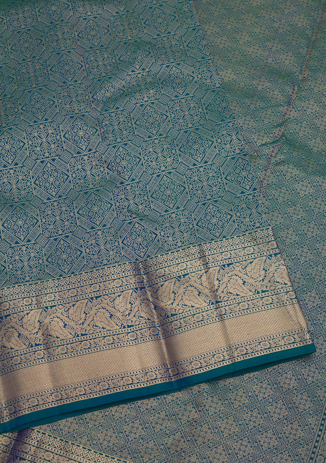Peacock Blue Silk Jaal Gold Zariwork Saree With Matching Blouse Piece