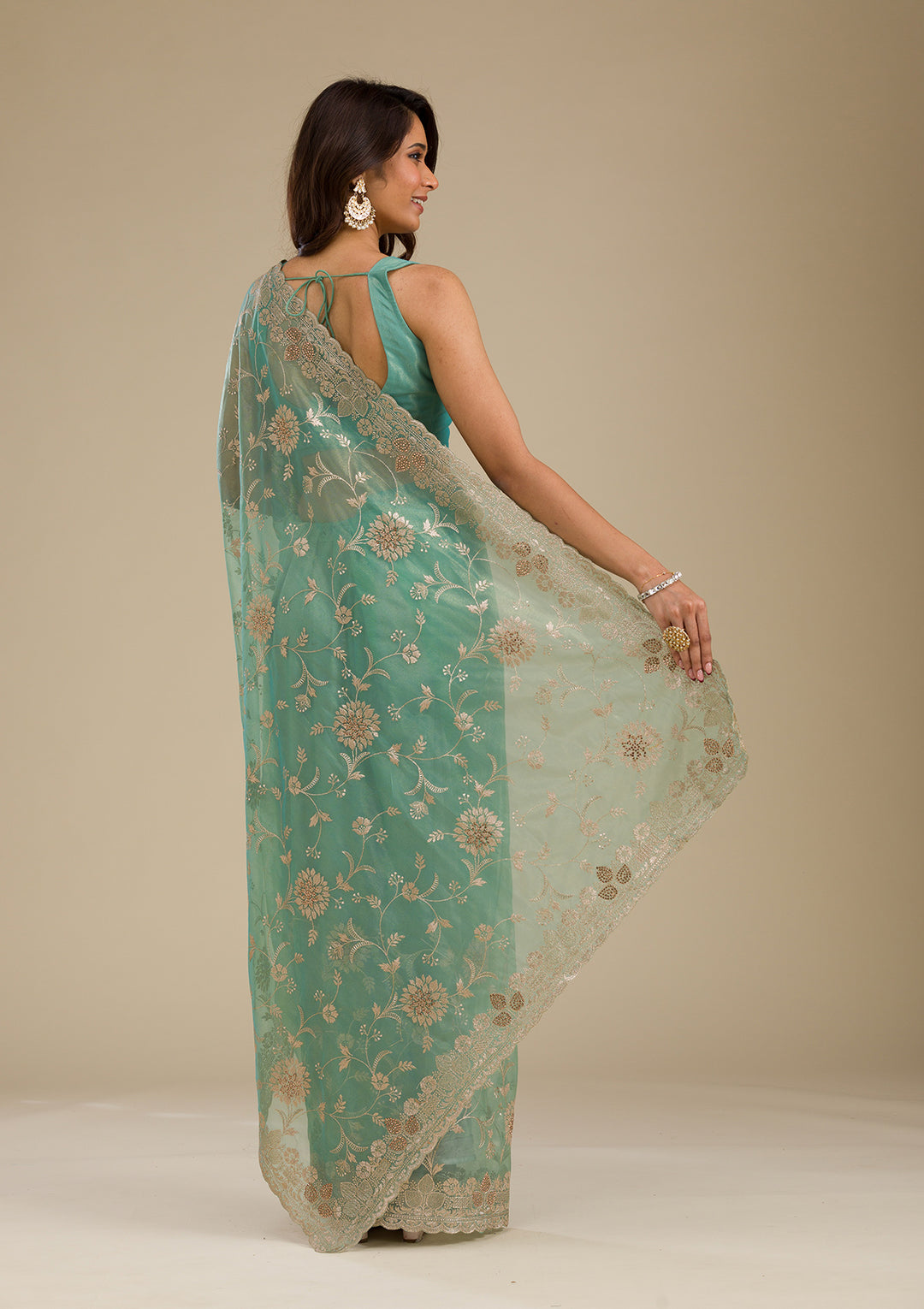 Peacock Green Tissue Gold Zariwork Saree With Matching Blouse Piece