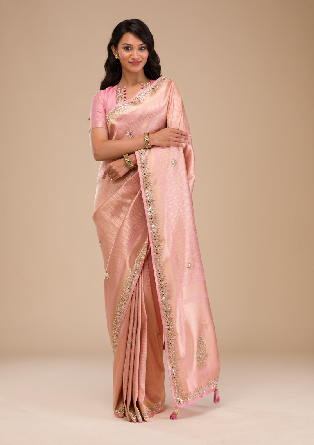Koskii Orange Saree with Exquisite Threadwork – Traditional Elegance