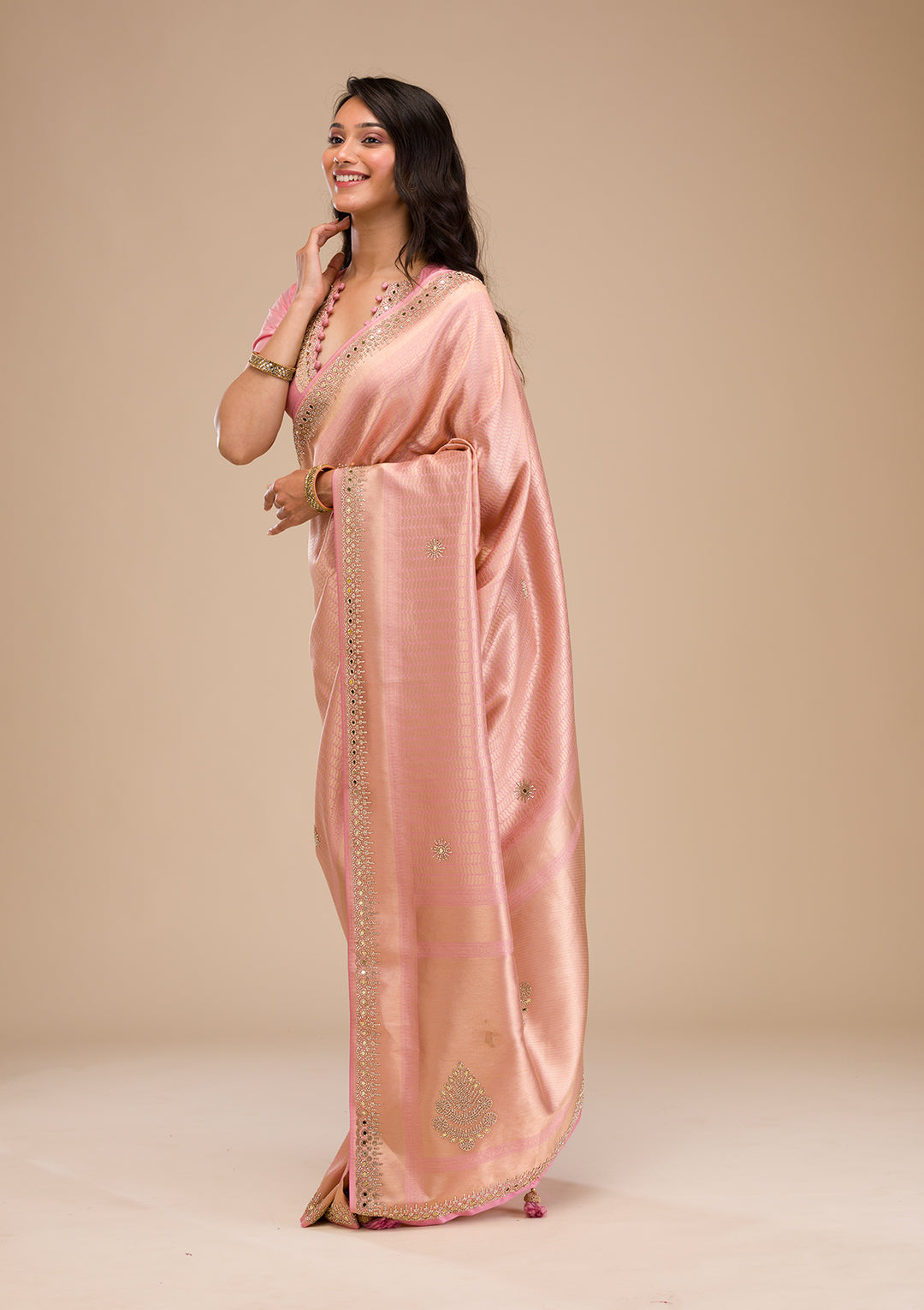 Koskii Orange Saree with Exquisite Threadwork – Traditional Elegance