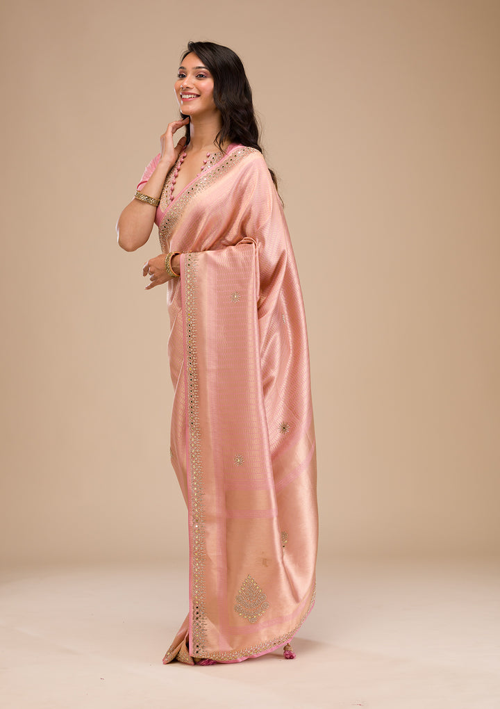 Koskii Orange Saree with Exquisite Threadwork – Traditional Elegance