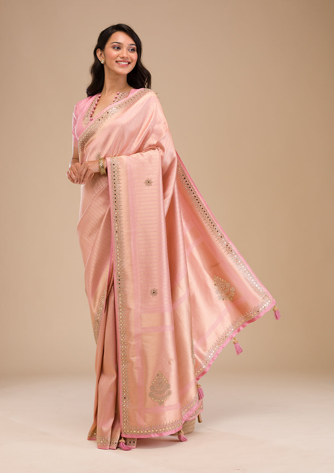 Koskii Orange Saree with Exquisite Threadwork – Traditional Elegance