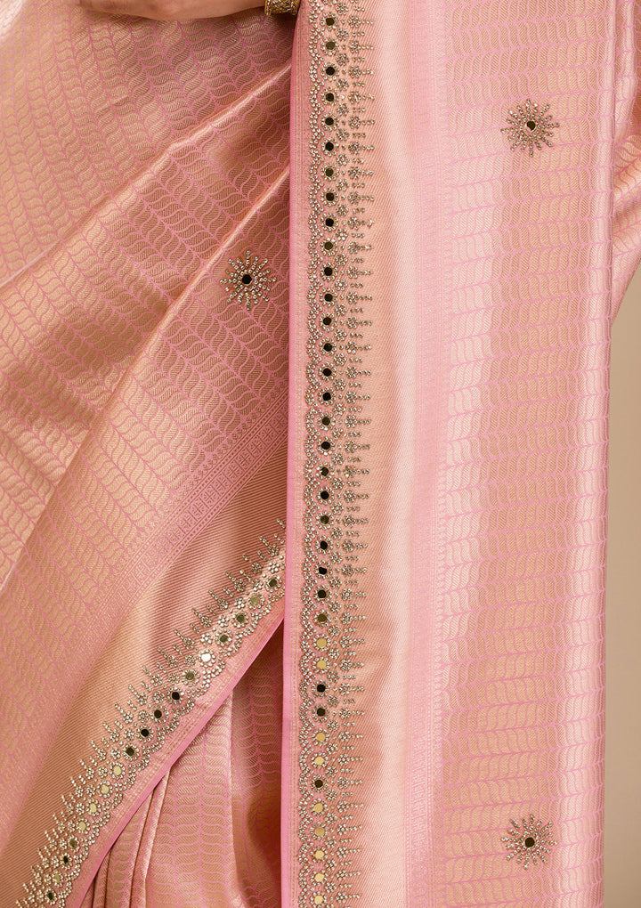 Koskii Orange Saree with Exquisite Threadwork – Traditional Elegance