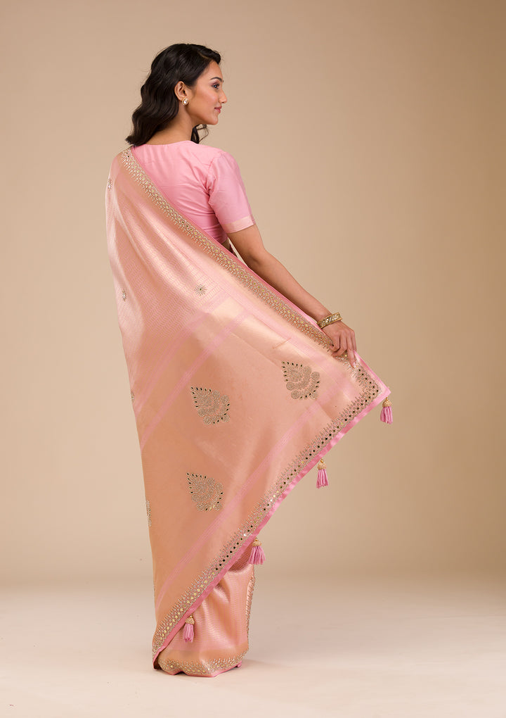 Koskii Orange Saree with Exquisite Threadwork – Traditional Elegance