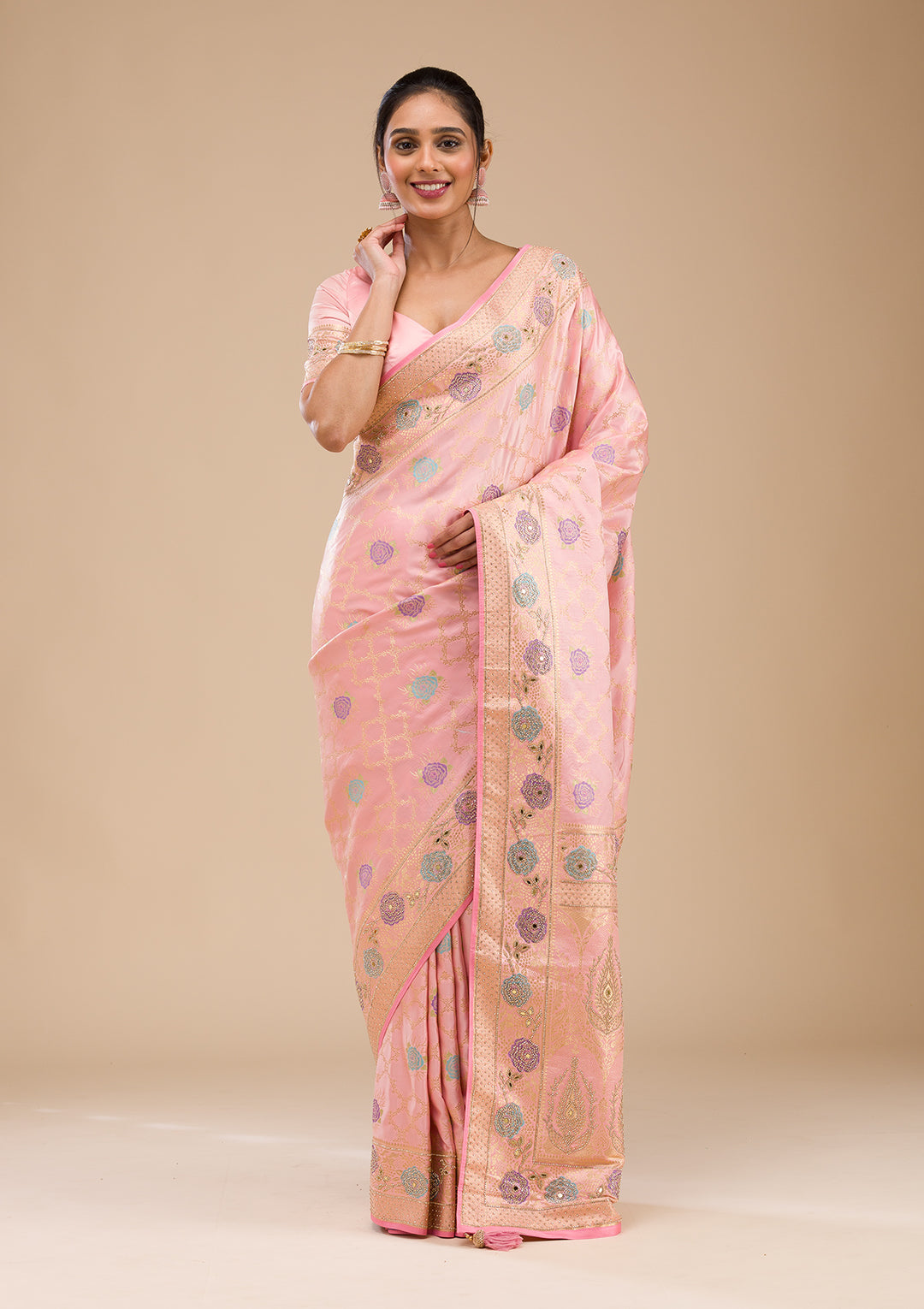 Koskii Orange Saree with Exquisite Threadwork – Traditional Elegance