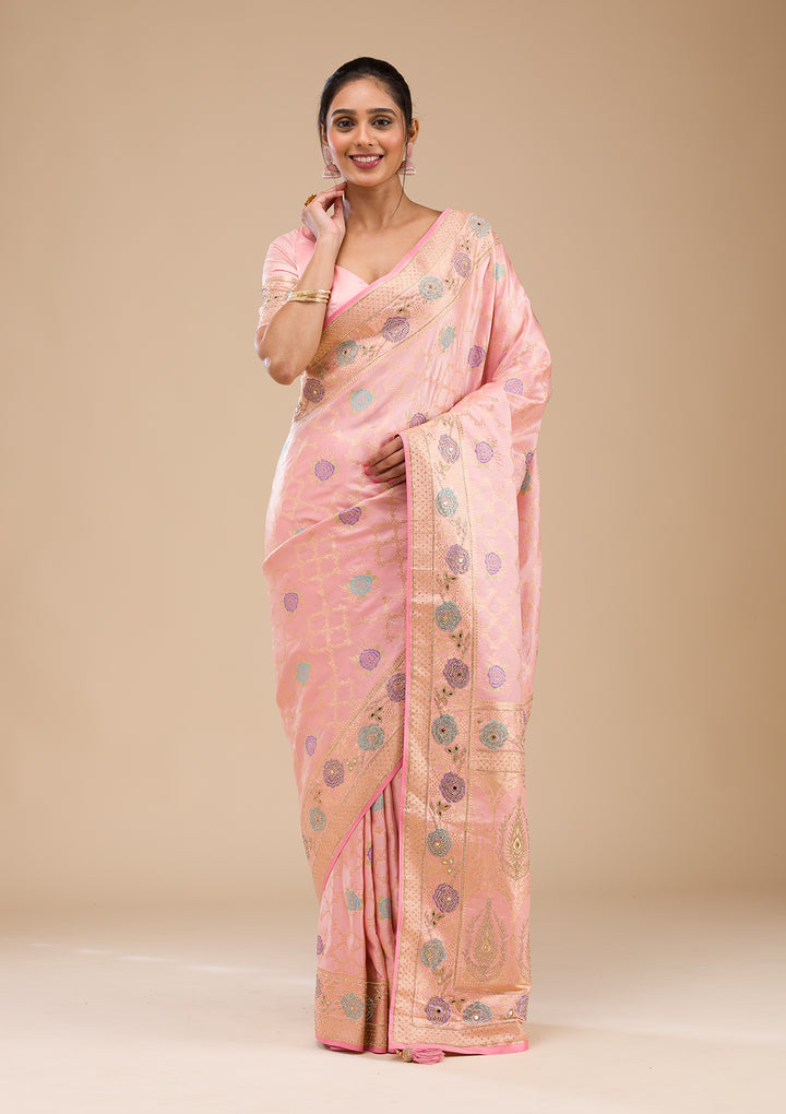 Koskii Orange Saree with Exquisite Threadwork – Traditional Elegance