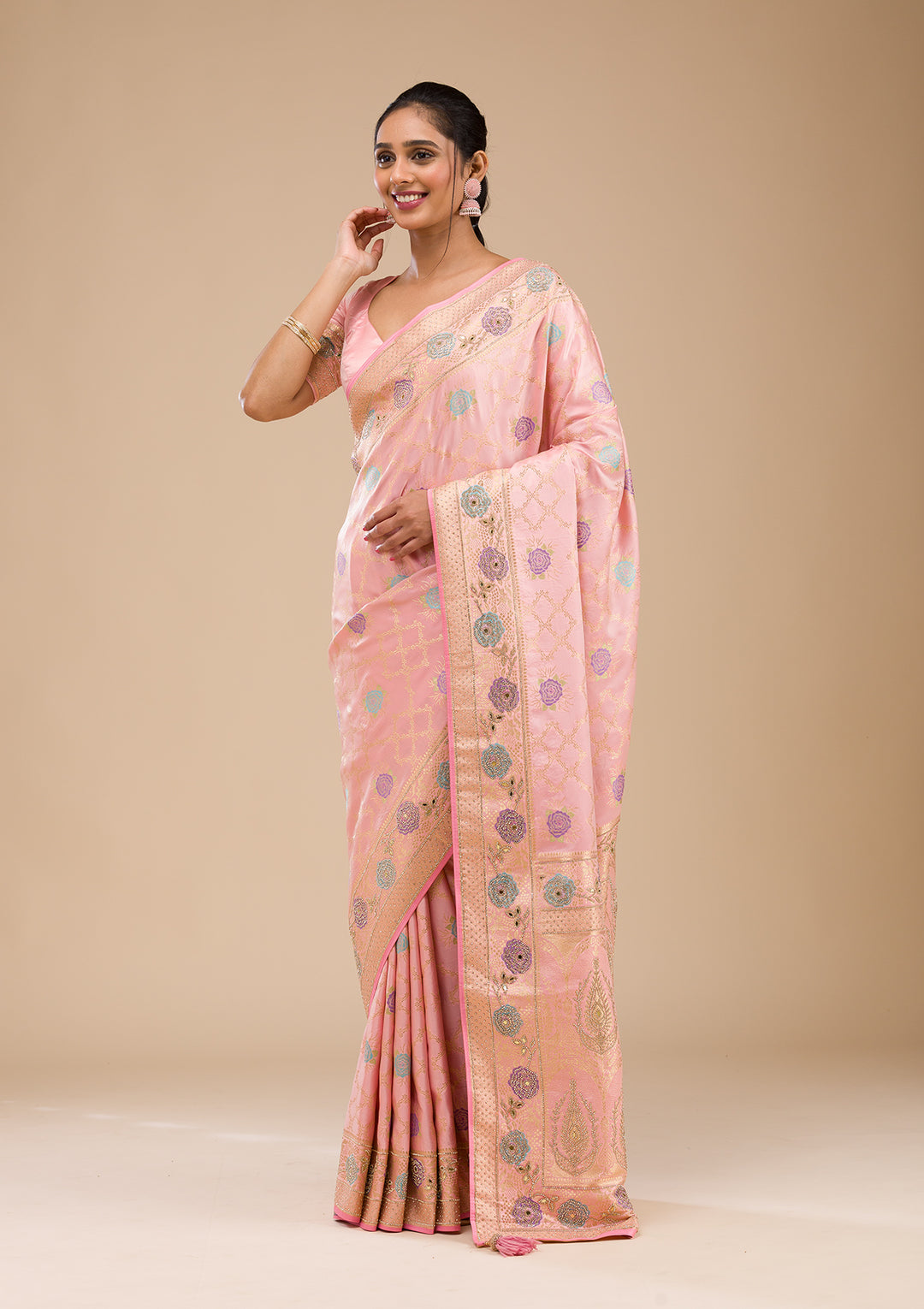 Koskii Orange Saree with Exquisite Threadwork – Traditional Elegance