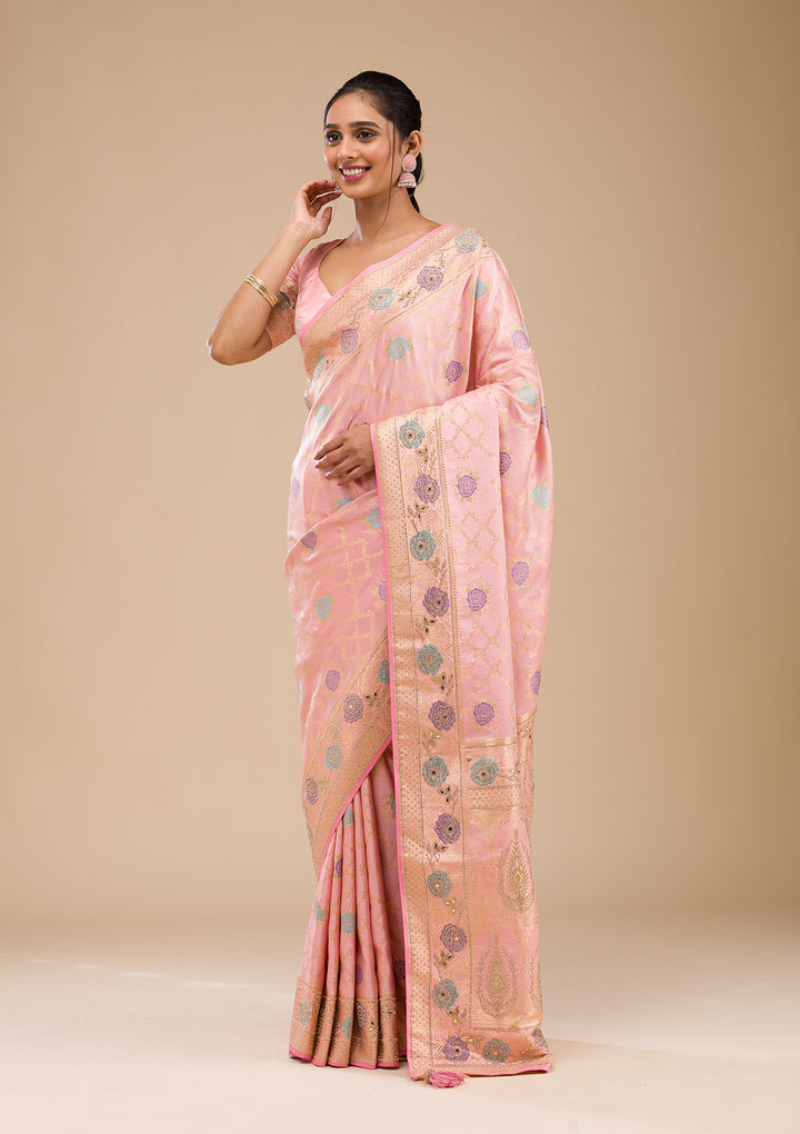Koskii Orange Saree with Exquisite Threadwork – Traditional Elegance