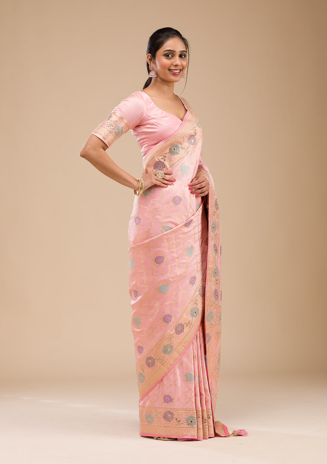 Koskii Orange Saree with Exquisite Threadwork – Traditional Elegance