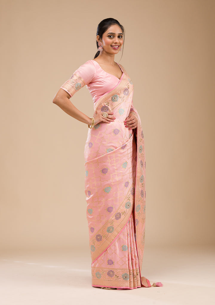Koskii Orange Saree with Exquisite Threadwork – Traditional Elegance