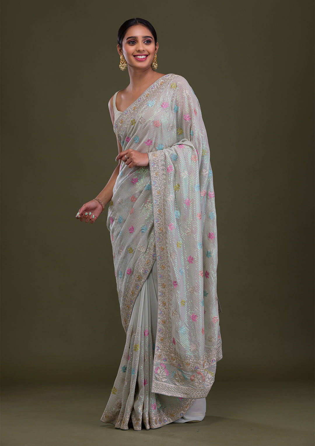 Pista Green Georgette Silver Zariwork Saree With Matching Blouse Piece