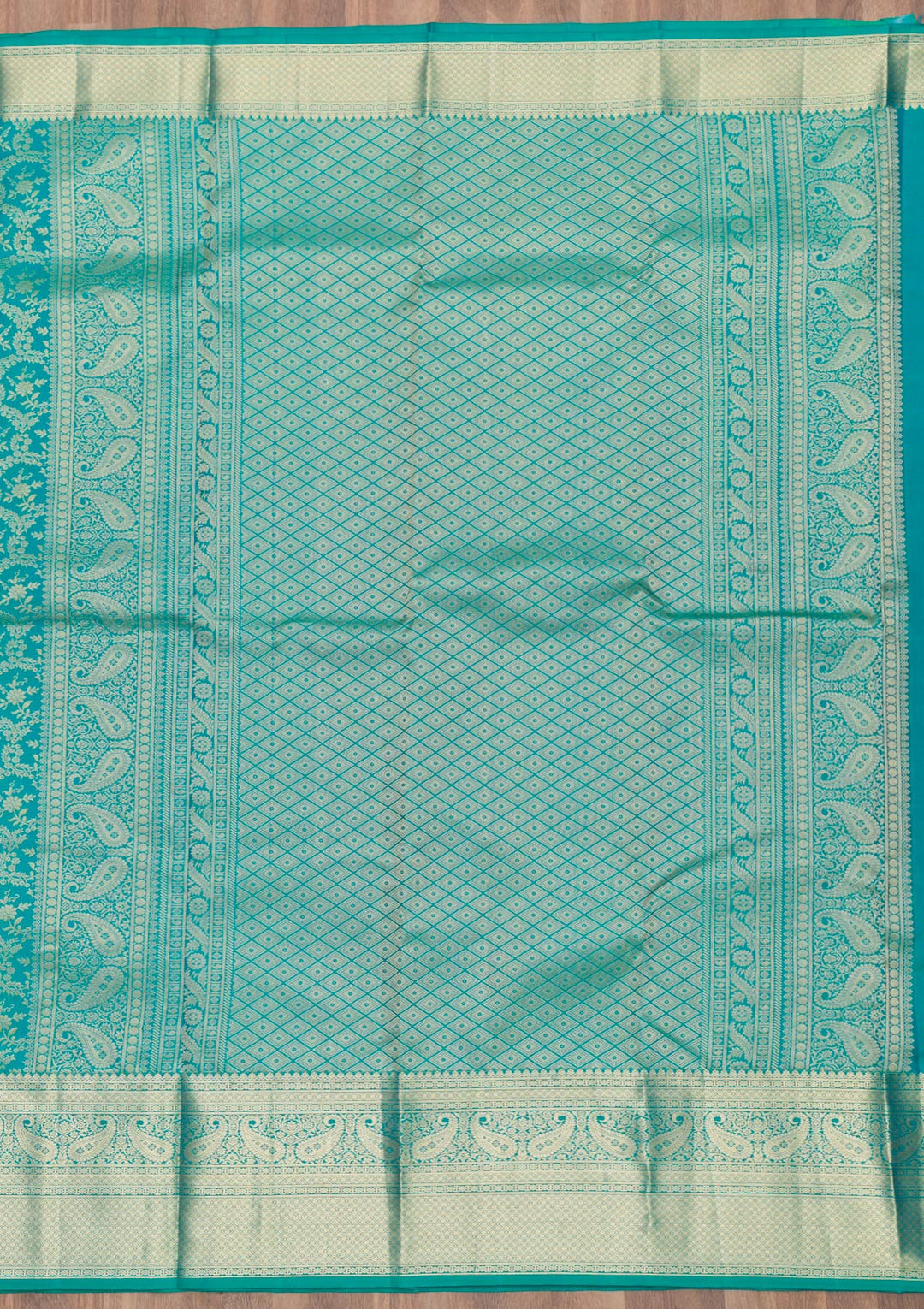 Peacock Blue Silk Jaal Gold Zariwork Saree With Matching Blouse Piece