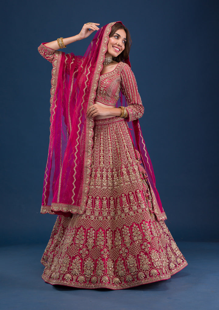 Koskii Net Maroon Lehenga – Exquisite Threadwork for Wedding Elegance