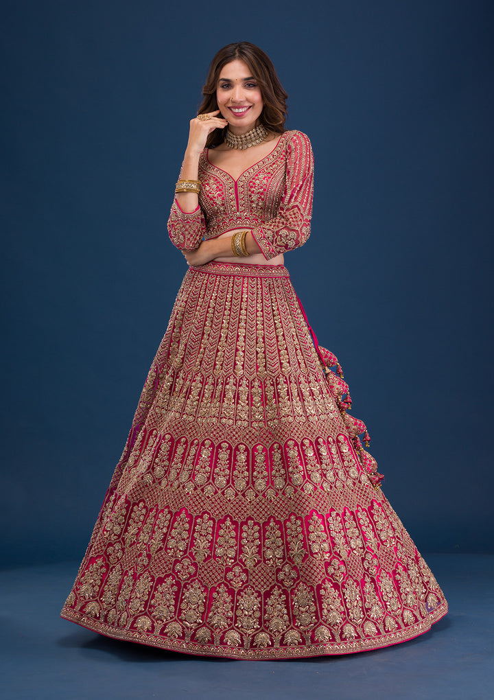 Koskii Net Maroon Lehenga – Exquisite Threadwork for Wedding Elegance