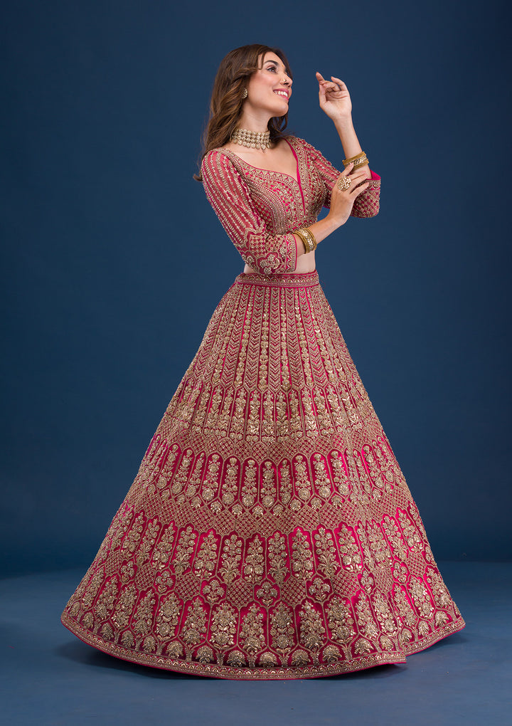 Koskii Net Maroon Lehenga – Exquisite Threadwork for Wedding Elegance