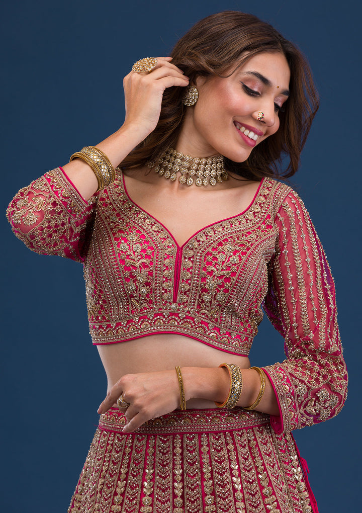 Koskii Net Maroon Lehenga – Exquisite Threadwork for Wedding Elegance