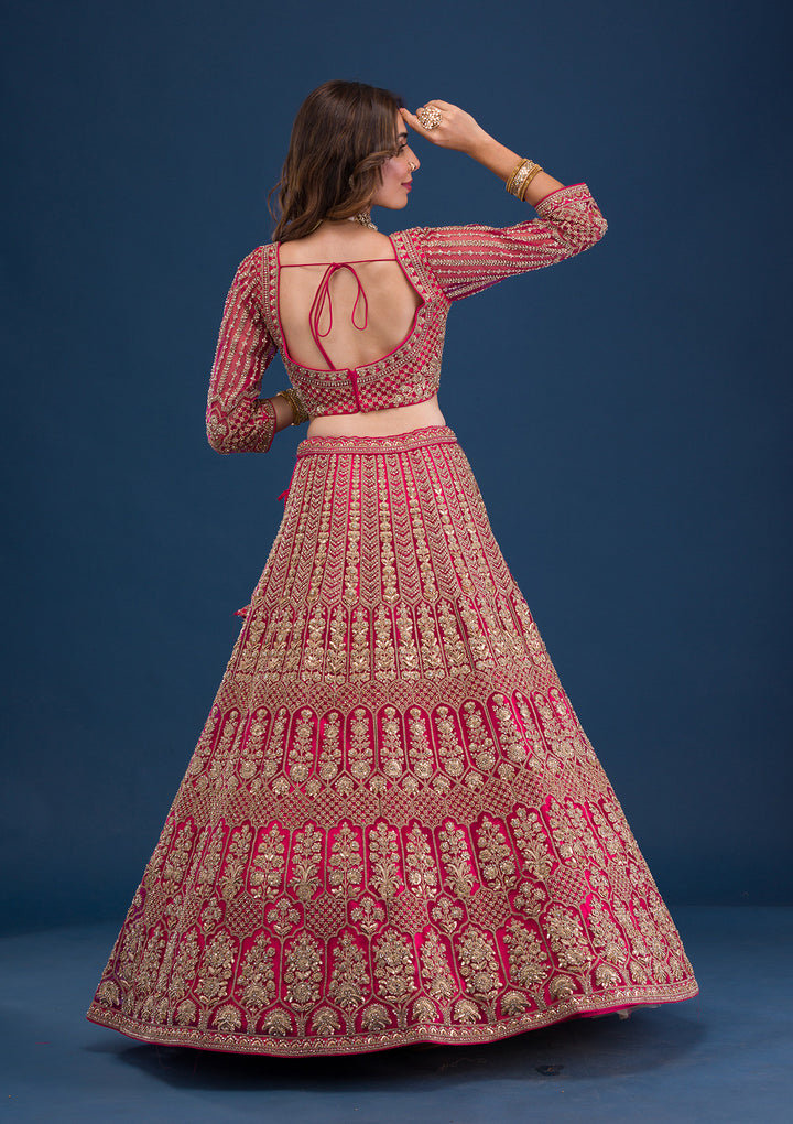 Koskii Net Maroon Lehenga – Exquisite Threadwork for Wedding Elegance