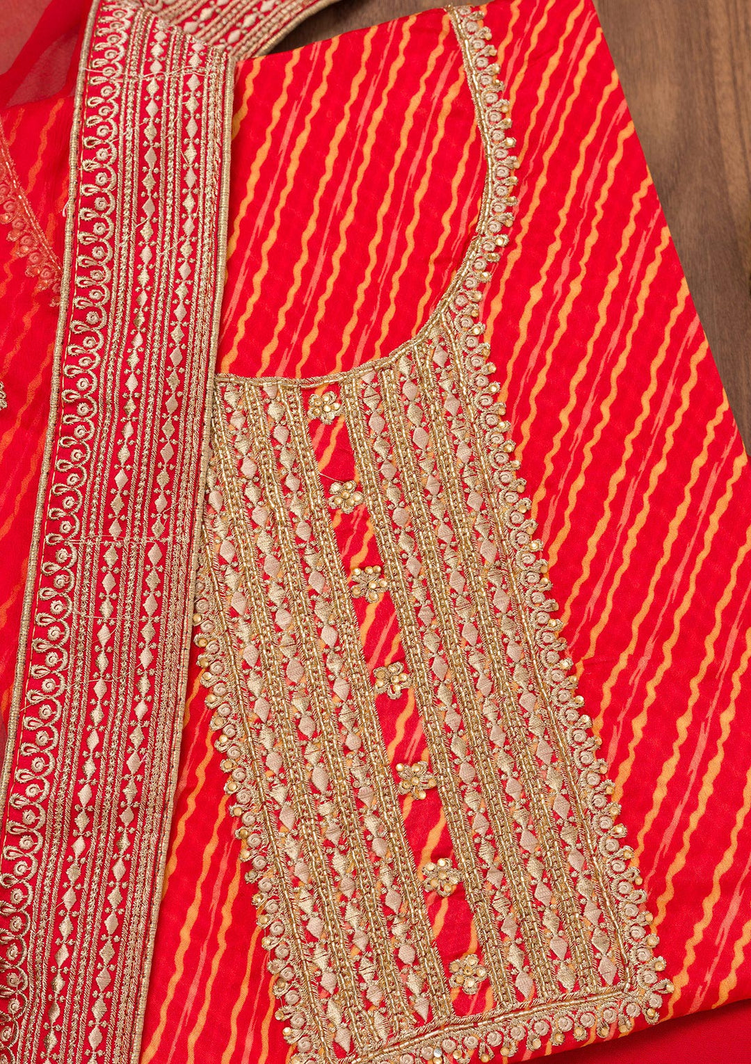 Red Georgette Bandhej Cutdana Unstitched Dress Material With Matching Bottom And Dupatta