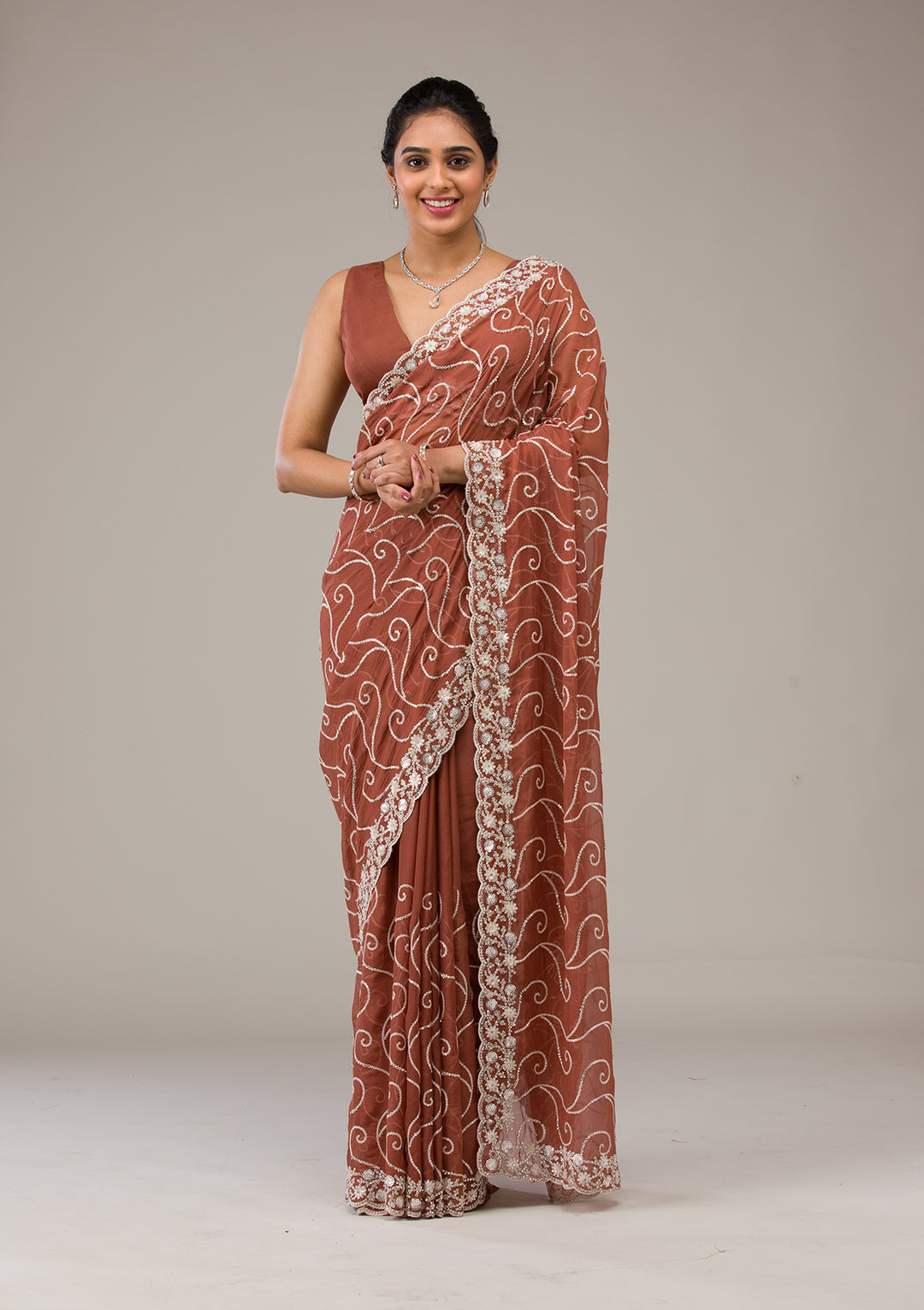 Rust Tissue Sequins Saree With Matching Blouse Piece