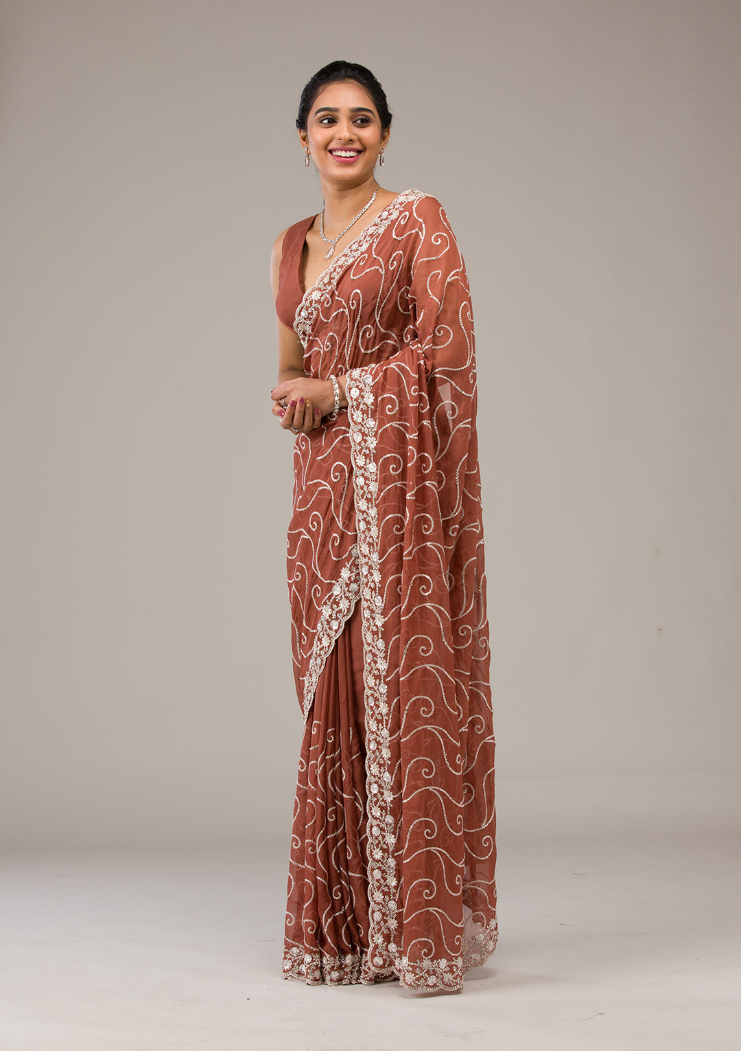 Rust Tissue Sequins Saree With Matching Blouse Piece