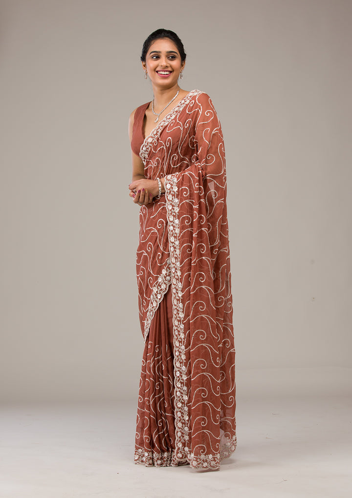 Rust Tissue Sequins Saree With Matching Blouse Piece