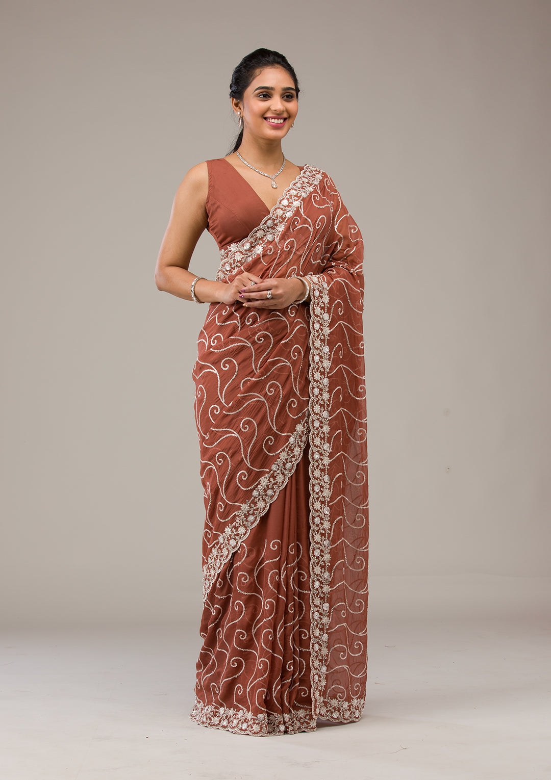 Rust Tissue Sequins Saree With Matching Blouse Piece
