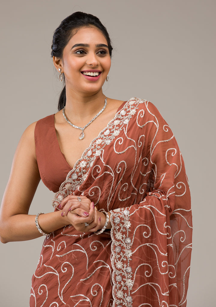 Rust Tissue Sequins Saree With Matching Blouse Piece