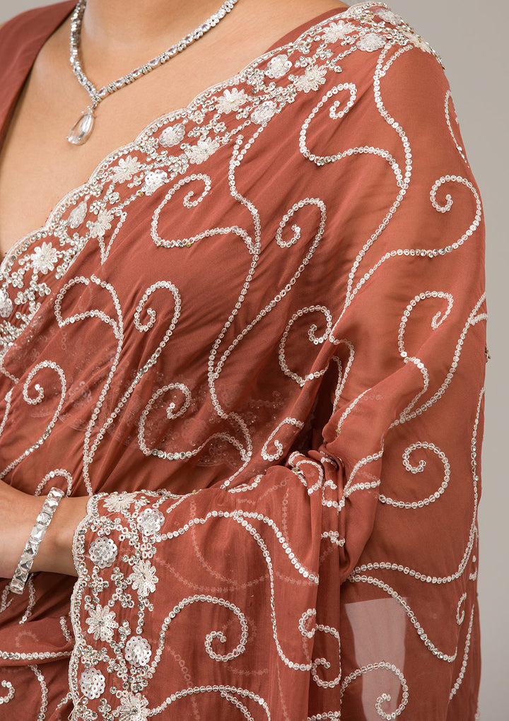Rust Tissue Sequins Saree With Matching Blouse Piece