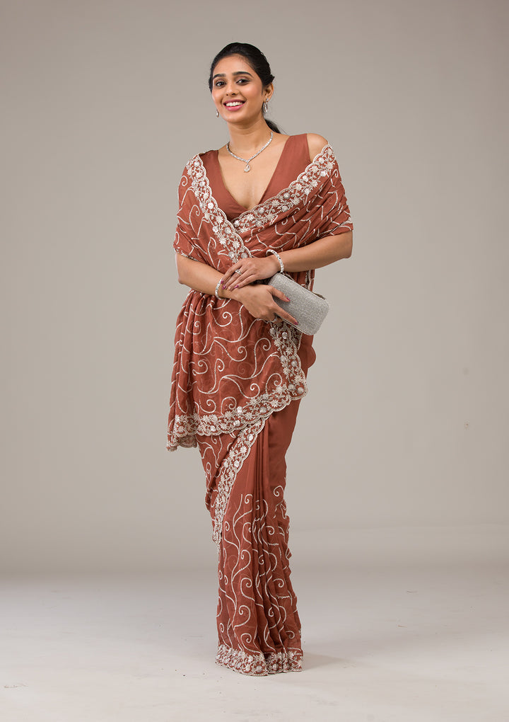 Rust Tissue Sequins Saree With Matching Blouse Piece