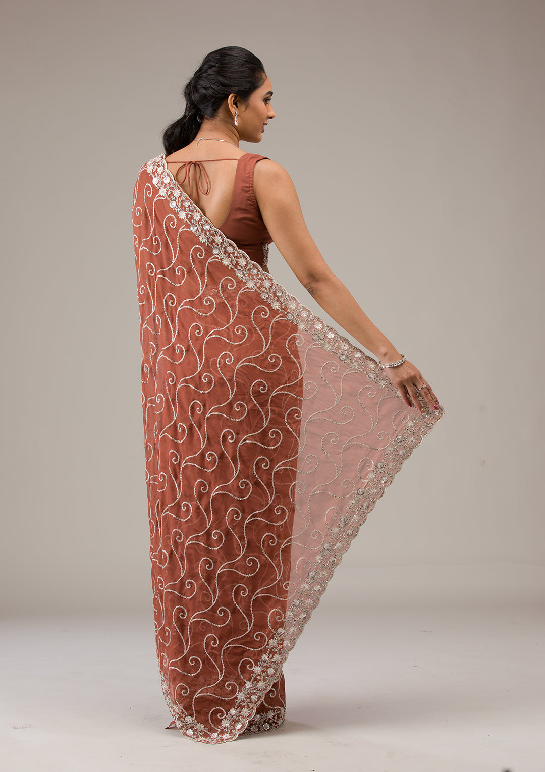 Rust Tissue Sequins Saree With Matching Blouse Piece