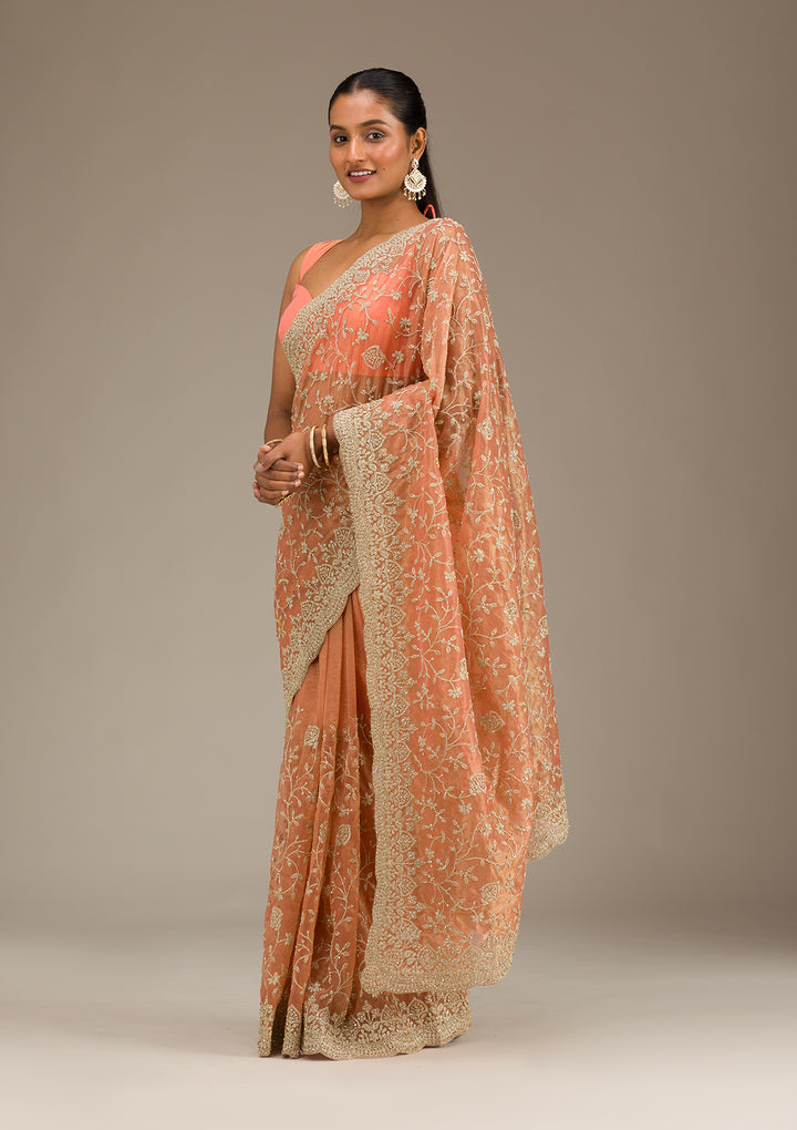Rust Tissue Gold Zariwork Saree With Matching Blouse Piece