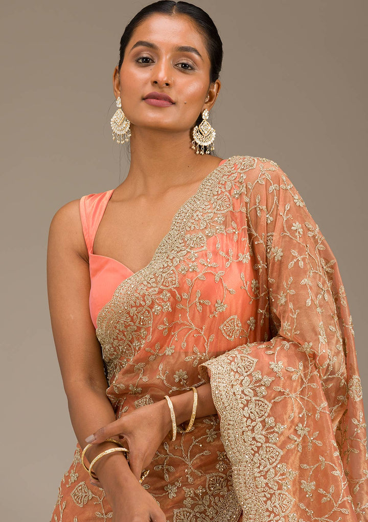 Rust Tissue Gold Zariwork Saree With Matching Blouse Piece