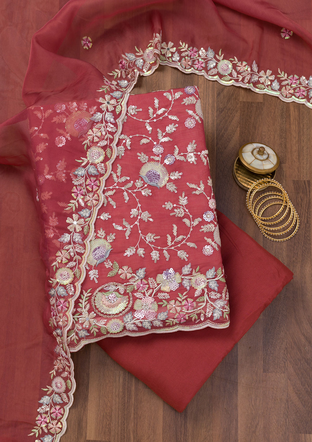 Rust Crepe Sequins Unstitched Dress Material With Matching Bottom And Dupatta
