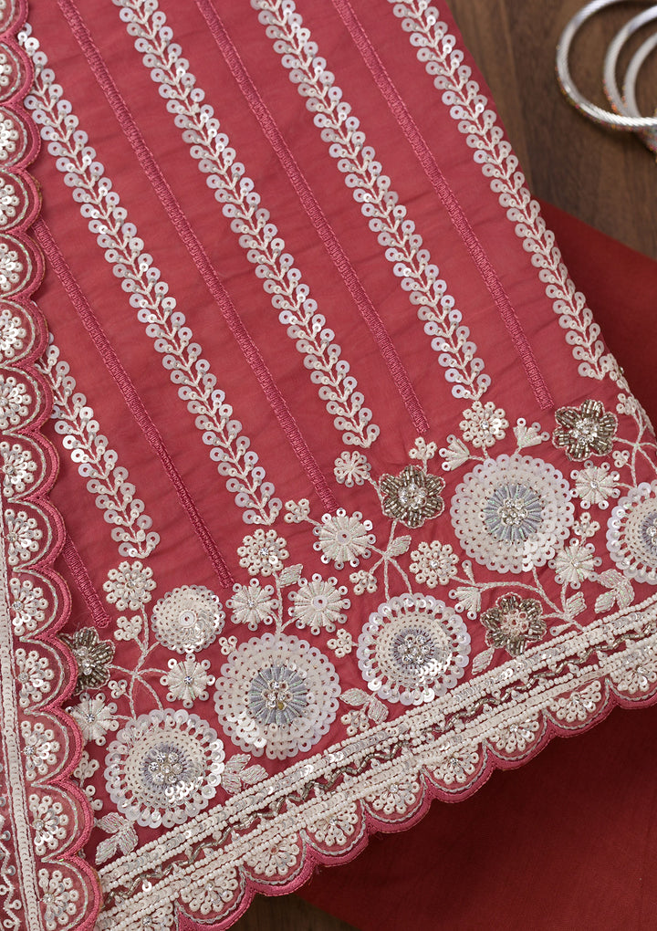 Rust Crepe Sequins Unstitched Dress Material With Matching Bottom And Dupatta