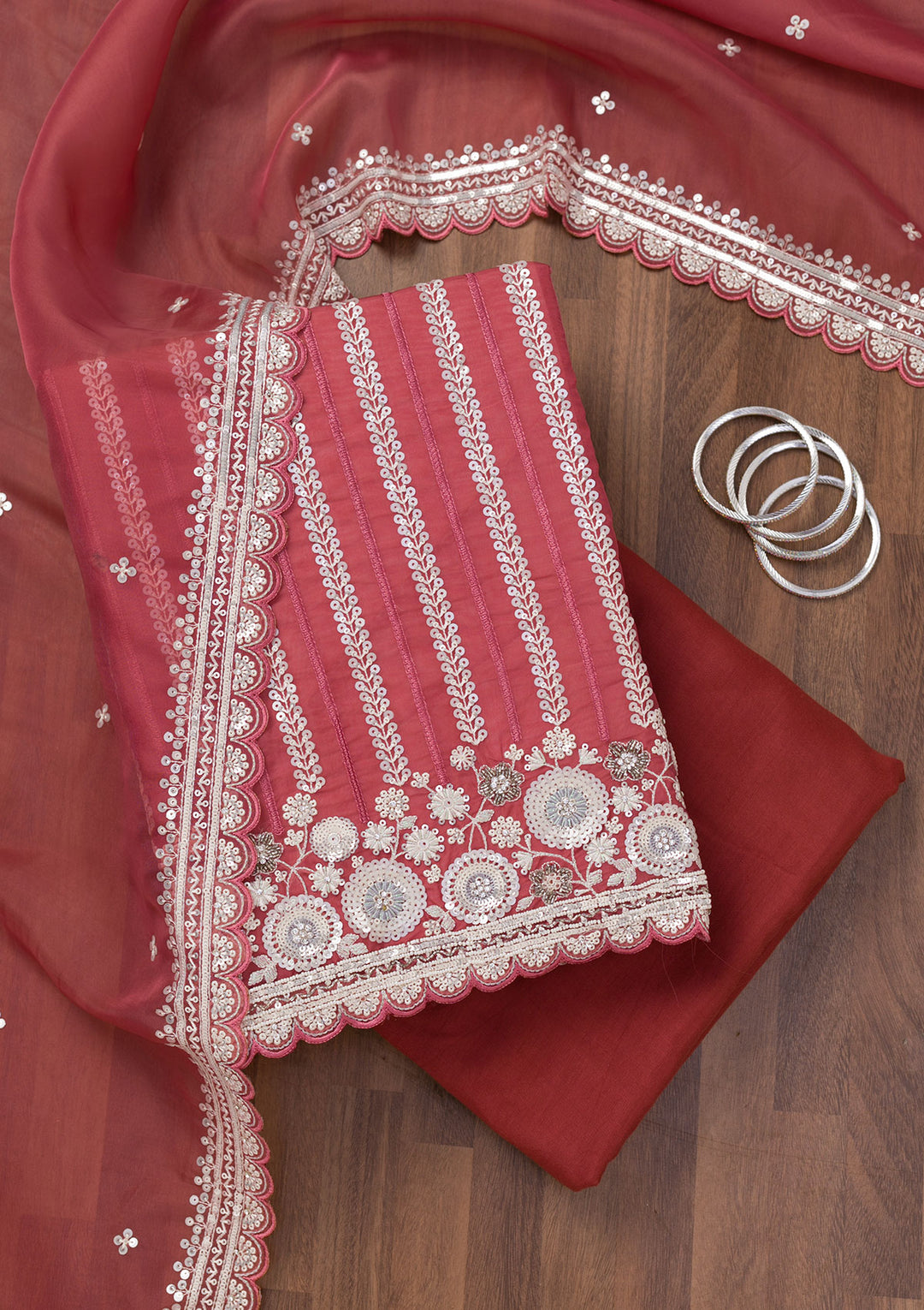 Rust Crepe Sequins Unstitched Dress Material With Matching Bottom And Dupatta
