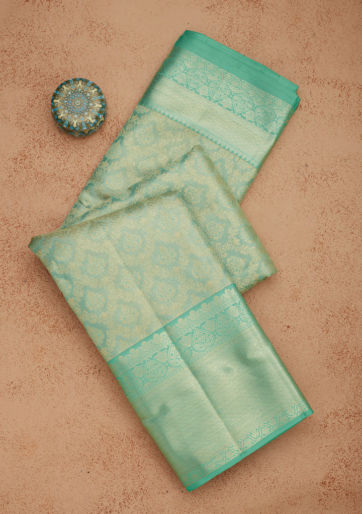 Sky Blue Tissue Jaal Saree With Matching Blouse Piece