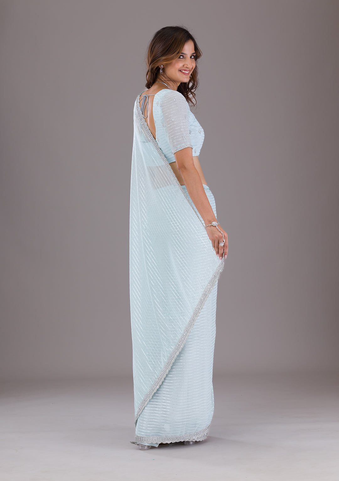Sky Blue Georgette Silver Stonework Saree With Matching Blouse Piece
