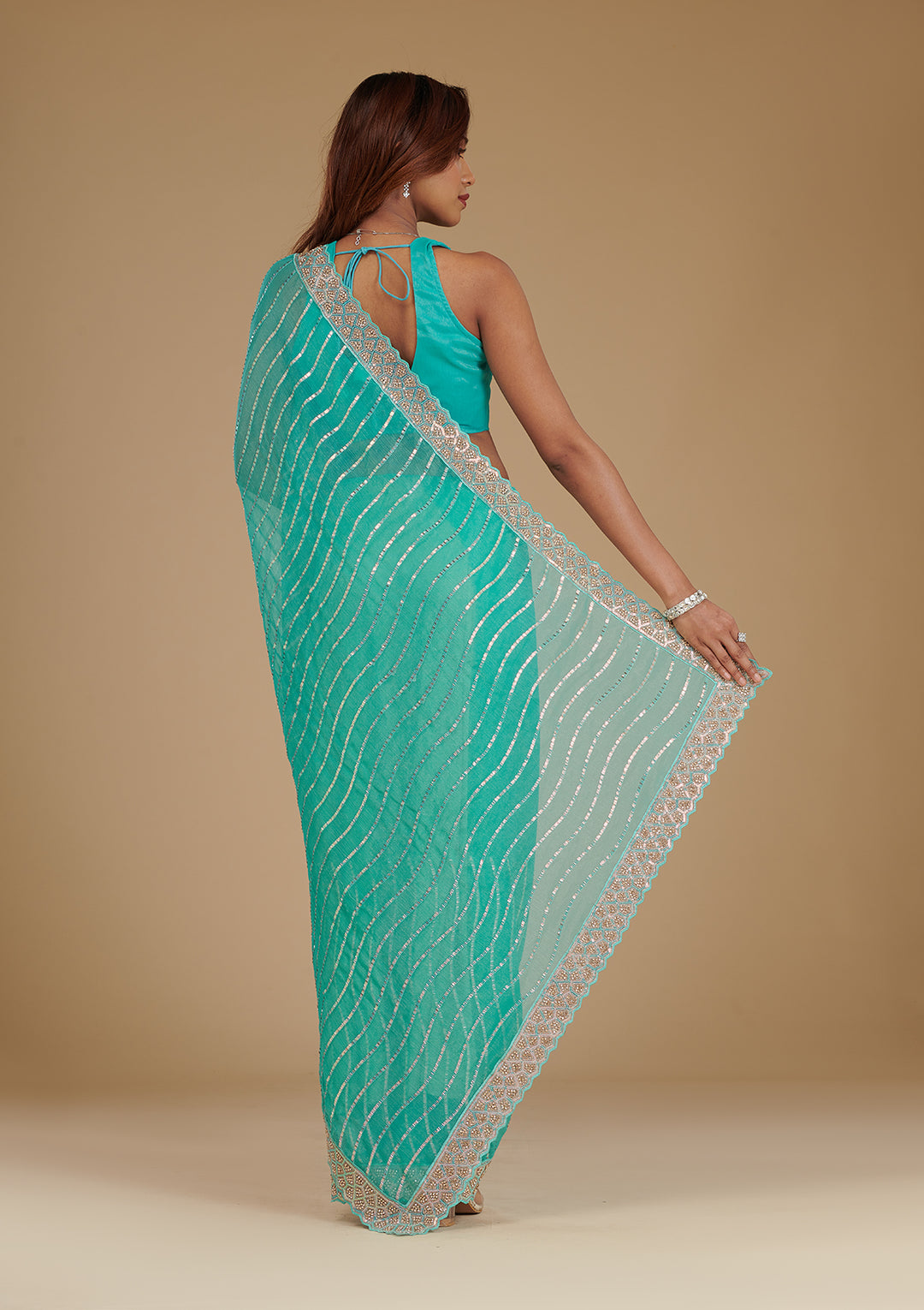Turquoise Blue Chiffon Sequins Saree With Matching Blouse Piece