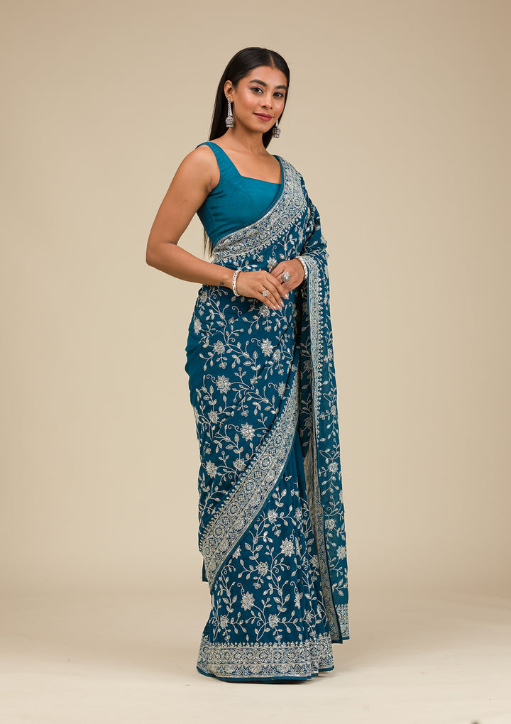Turquoise Blue Georgette Threadwork Saree With Matching Blouse Piece