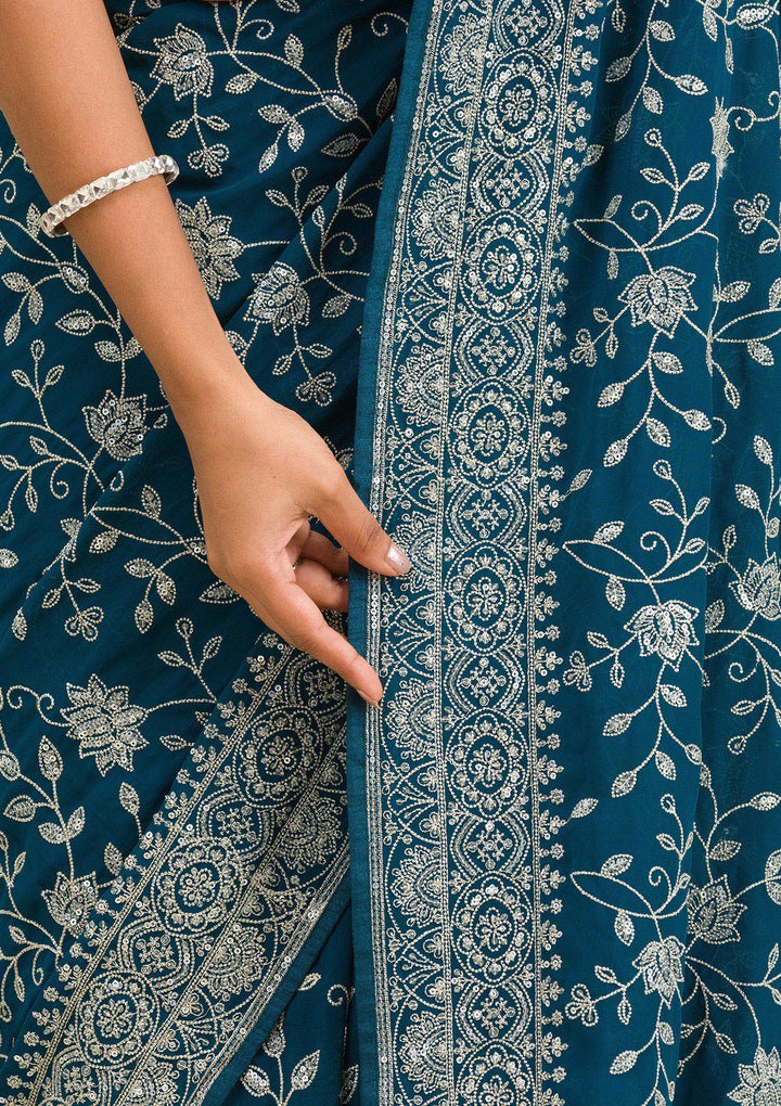 Turquoise Blue Georgette Threadwork Saree With Matching Blouse Piece