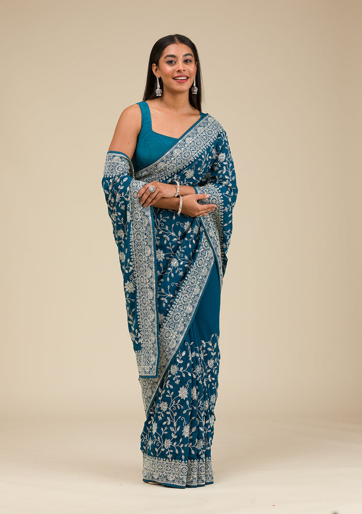 Turquoise Blue Georgette Threadwork Saree With Matching Blouse Piece