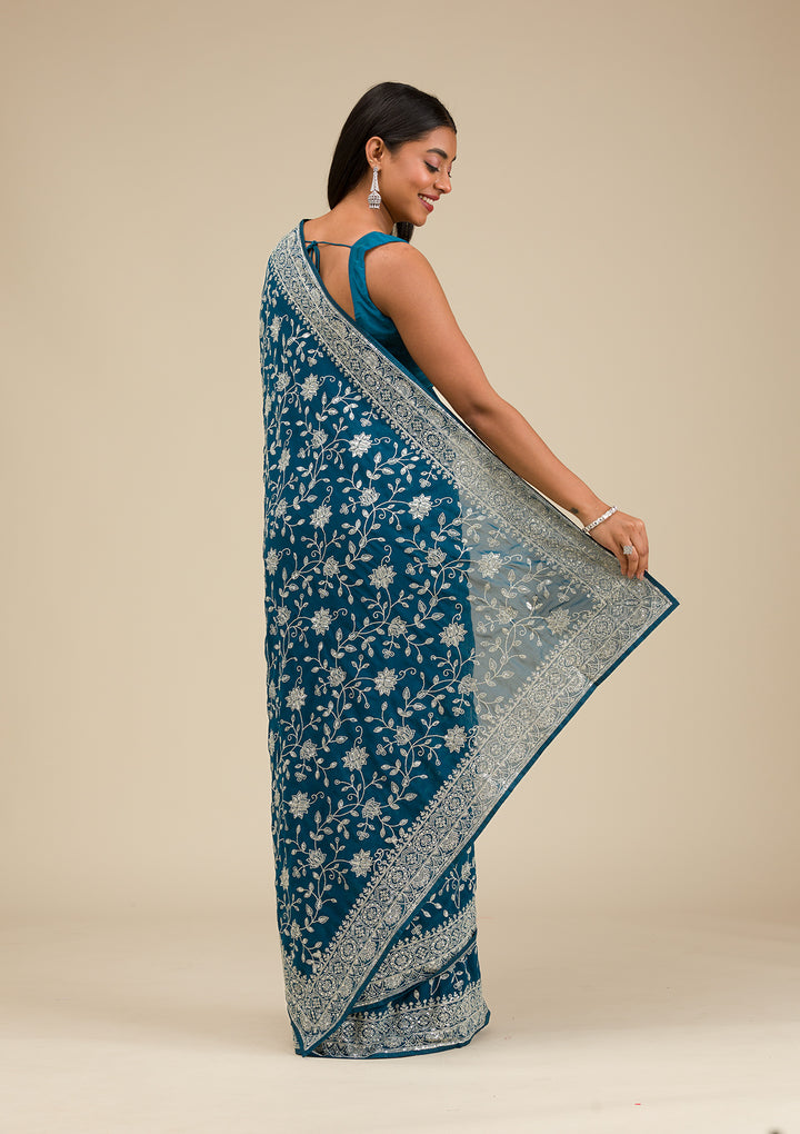 Turquoise Blue Georgette Threadwork Saree With Matching Blouse Piece