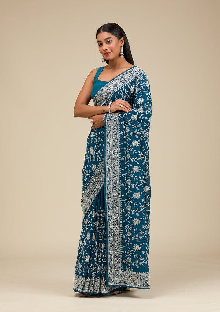 Turquoise Blue Georgette Threadwork Saree With Matching Blouse Piece