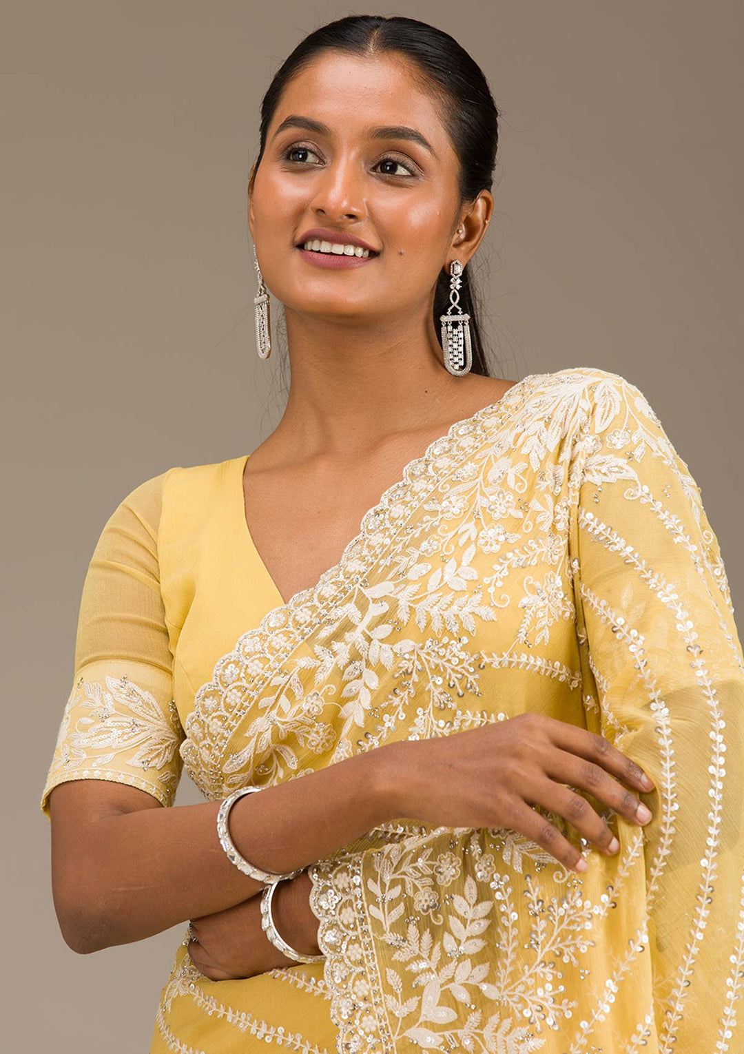 Yellow Georgette Sequins Saree With Matching Blouse Piece