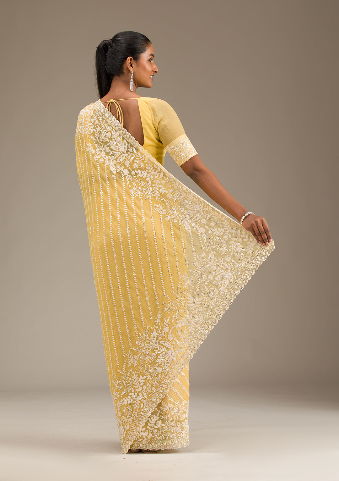Yellow Georgette Sequins Saree With Matching Blouse Piece