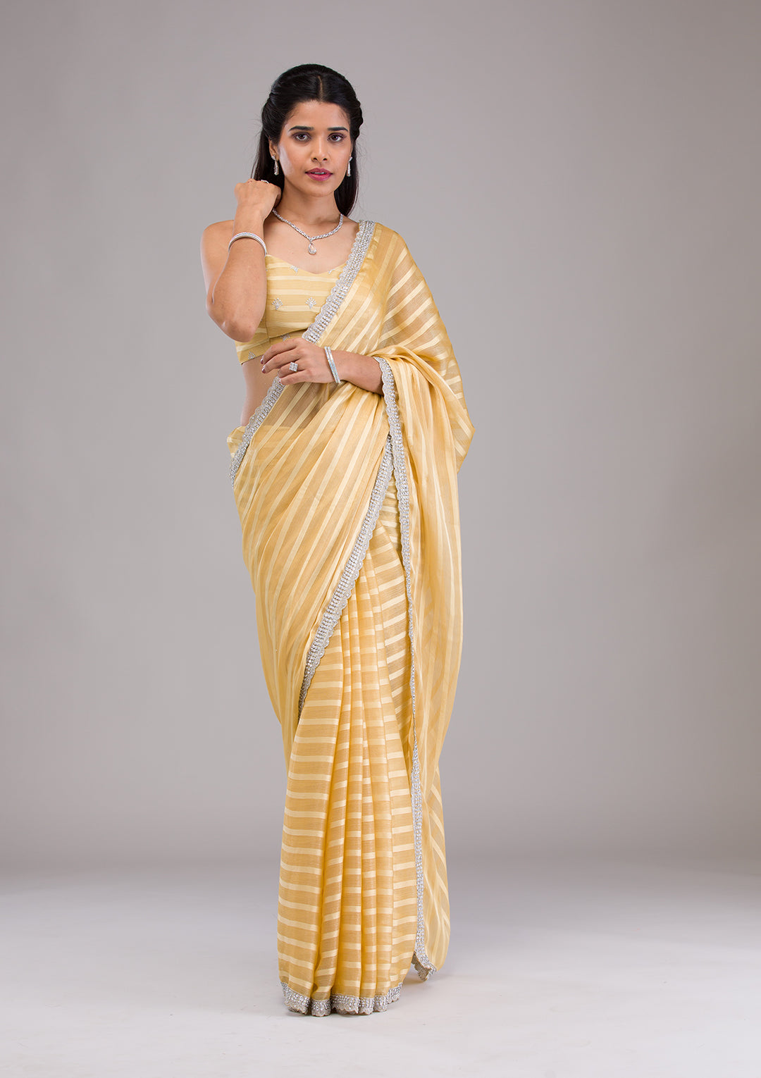 Yellow Stonework Semi Crepe Saree