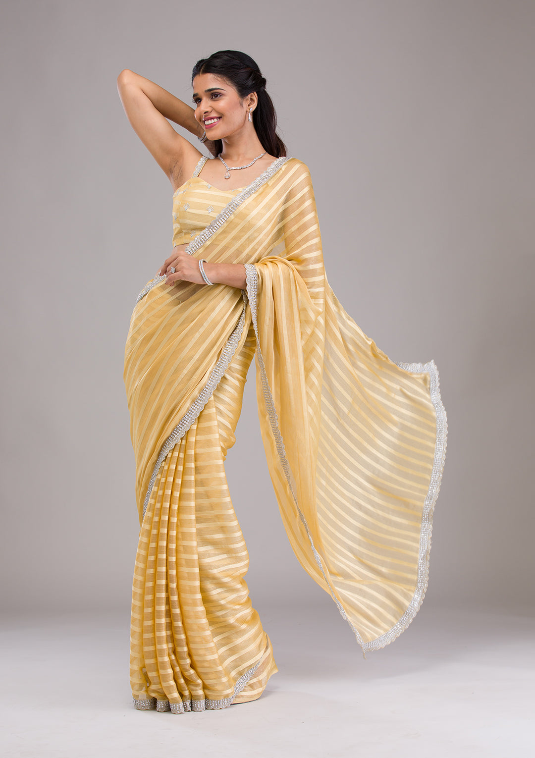 Yellow Stonework Semi Crepe Saree